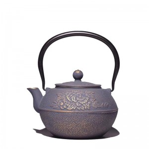 Cast iron teapot with flower design